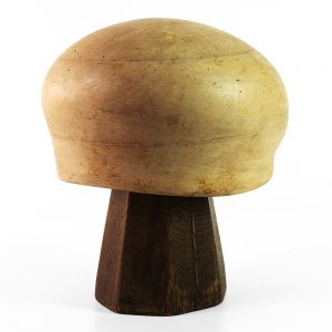 Back view of round crown hat block.