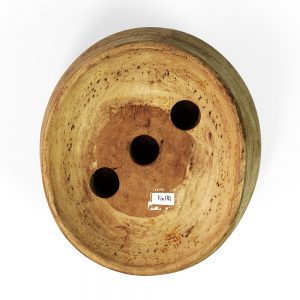 Underside of round crown block with recess feature.