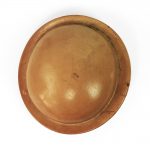 Top view of round beret hat block.